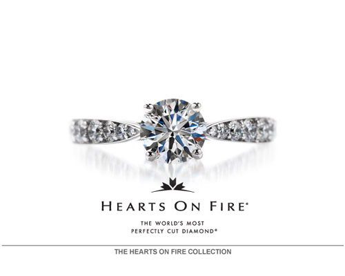 A perfect ring of eight hearts when viewed from the bottom. A perfectly formed symmetrical fireburst of light when seen from the top. Diamonds cut and polished at 100X magnification - 10 times the industry standard. That's the perfection of a Hearts On Fire diamond. It's a perfection you can see. Hearts On Fire, The World's Most Perfectly Cut Diamond